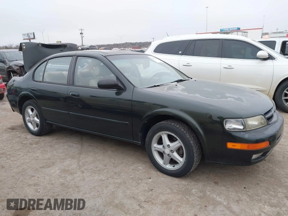 1998 Nissan Maxima GXE with VIN JN1CA21D4WT605270, listed as a IAAI auction lot 41505206 with 114,425 mi miles and . Bid and sale history available at DreamBid. Image 13.