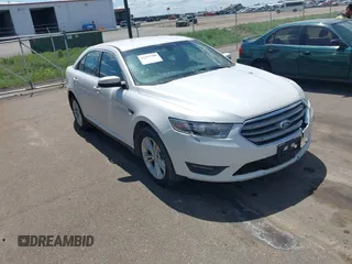 2015 Ford Taurus SEL z VIN 1FAHP2E82FG105766, wystawiony jako IAAI lot #42327700 z przebiegiem 187 185 mil mil oraz . Historia ofert i sprzedaży dostępna na DreamBid. Obrazek 1.