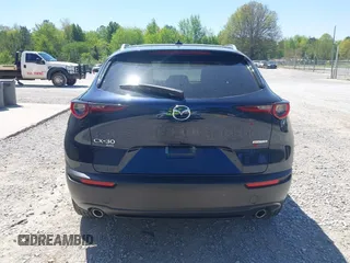 2024 Mazda CX-30 2.5 S Premium Package with VIN 3MVDMBDM7RM654243, listed as a IAAI auction lot 42044783 with 27,936 mi miles. Bid and sale history available at carsss.com. Image 16.