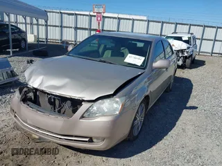 2006 Toyota Avalon XL with VIN 4T1BK36B46U148453, listed as a IAAI auction lot 41740381 with 124,579 mi miles. Bid and sale history available at carsss.com. Image 6.