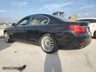2012 BMW 7 Series 750i xDrive with VIN WBAKC6C58CC396835, listed as a Copart auction lot 86833724 with 0 mi miles and Salvage Title. Bid and sale history available at carsss.com. Image 2.