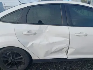 2018 Ford Focus SE with VIN 1FADP3F23JL242066, listed as a IAAI auction lot 41804512 with 99,662 mi miles. Bid and sale history available at carsss.com. Image 6.