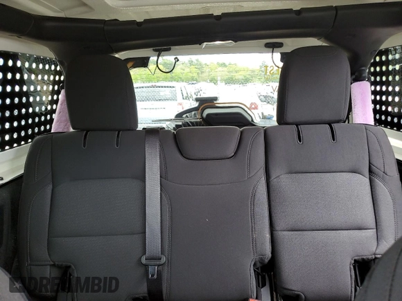 2023 Jeep Wrangler Sport S with VIN 1C4HJXDN6PW618252, listed as a Copart auction lot 55939455 with 69,681 mi miles and Salvage title. Bid and sale history available at DreamBid. Image 10.