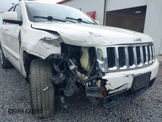 2011 Jeep Grand Cherokee Laredo with VIN 1J4RR4GG6BC680943, listed as a IAAI auction lot 42419575 with 188,672 mi miles and . Bid and sale history available at DreamBid. Image 6.