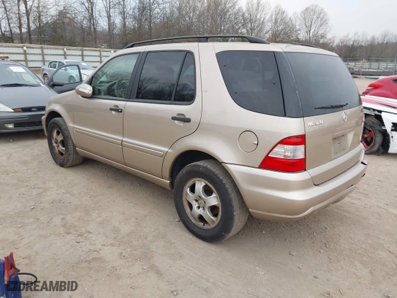 2002 Mercedes-Benz M-Class with VIN 4JGAB54E82A308902, listed as a IAAI auction lot 41779482 with 99,933 mi miles. Bid and sale history available at carsss.com. Image 3.