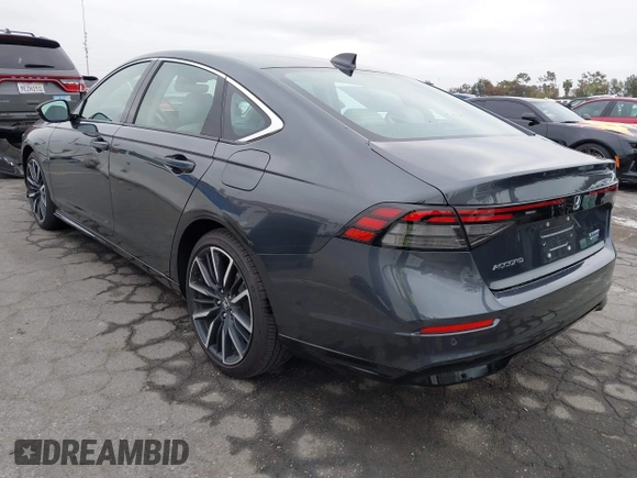 2024 Honda Accord Touring with VIN 1HGCY2F82RA070008, listed as a IAAI auction lot 42027911 with 13,878 mi miles and . Bid and sale history available at DreamBid. Image 3.