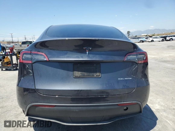 2024 Tesla Model Y Long Range with VIN 7SAYGDEE6RA226035, listed as a Copart auction lot 52539375 with 14,220 mi miles and Salvage title. Bid and sale history available at DreamBid. Image 6.