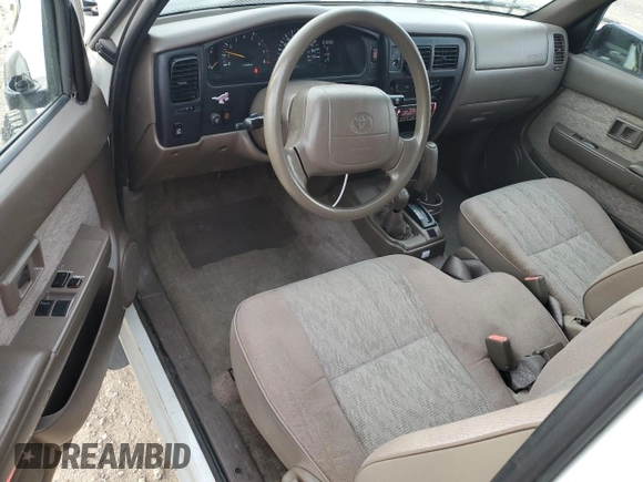 1998 Toyota Tacoma with VIN 4TAWN72N8WZ113174, listed as a Copart auction lot 84641064 with 148,221 mi miles and Salvage Title. Bid and sale history available at DreamBid. Image 8.