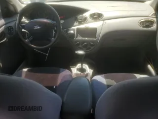 2004 Ford Focus SE with VIN 1FAFP36384W191801, listed as a Copart auction lot 63661465 with 144,226 mi miles and Salvage title. Bid and sale history available at DreamBid. Image 8.