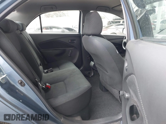 2009 Toyota Yaris with VIN JTDBT903791302911, listed as a IAAI auction lot 42181264 with 183,321 mi miles. Bid and sale history available at carsss.com. Image 8.