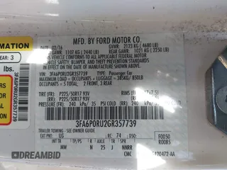 2016 Ford Fusion Titanium Hybrid with VIN 3FA6P0RU2GR357739, listed as a IAAI auction lot 42120441 with 151,201 mi miles. Bid and sale history available at carsss.com. Image 9.