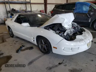 2001 Pontiac Firebird Formula z VIN 2G2FV22G212134322, wystawiony jako Copart lot #70813194 z przebiegiem Nie podano mil oraz Szkody całkowita. Historia ofert i sprzedaży dostępna na DreamBid. Obrazek 4.