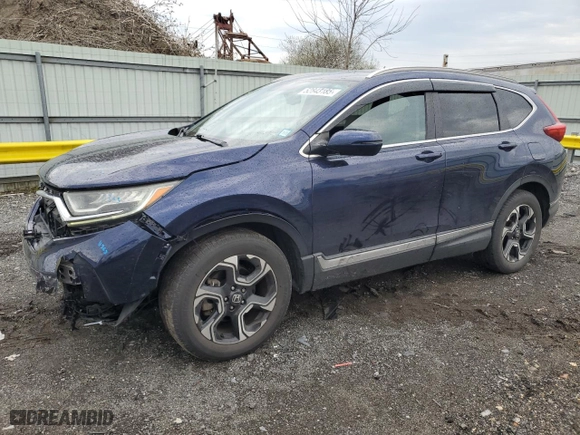 2017 Honda CR-V Touring with VIN 2HKRW2H96HH636330, listed as a Copart auction lot 52843185 with 84,604 mi miles and Salvage Title. Bid and sale history available at carsss.com. Image 1.