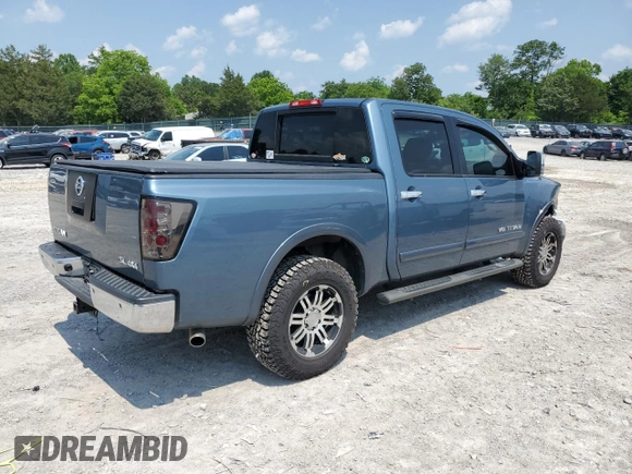 2011 Nissan Titan SL with VIN 1N6AA0EC4BN305296, listed as a Copart auction lot 59001395 with 194,557 mi miles and Salvage title. Bid and sale history available at DreamBid. Image 3.