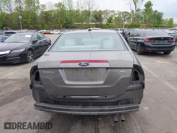 2011 Ford Fusion SE with VIN 3FAHP0HA1BR203046, listed as a IAAI auction lot 42011121 with 302,078 mi miles. Bid and sale history available at carsss.com. Image 17.