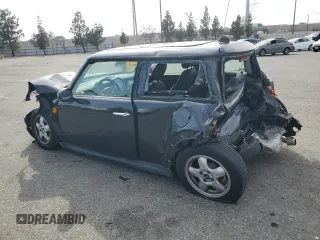 2007 MINI Hardtop z VIN WMWMF33537TT54433, wystawiony jako Copart lot #58813415 z przebiegiem 111 250 mil mil oraz Szkoda całkowita • Salvage title. Historia ofert i sprzedaży dostępna na DreamBid. Obrazek 2.