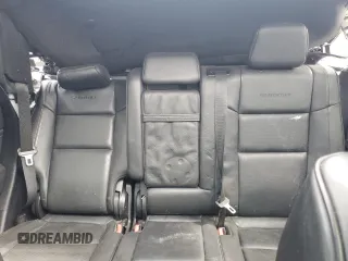2015 Jeep Grand Cherokee Summit with VIN 1C4RJFJG2FC913658, listed as a Copart auction lot 52160035 with 138,008 mi miles and Salvage Title. Bid and sale history available at DreamBid. Image 10.
