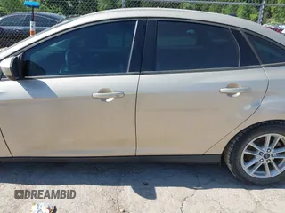 2018 Ford Focus SE z VIN 1FADP3FEXJL210905, wystawiony jako IAAI lot #42264105 z przebiegiem 136 499 mil mil oraz . Historia ofert i sprzedaży dostępna na DreamBid. Obrazek 14.
