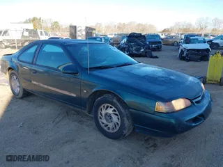 1995 Ford Thunderbird LX with VIN 1FALP62W3SH191775, listed as a IAAI auction lot 41250513 with 150,743 mi miles. Bid and sale history available at carsss.com. Image 1.