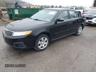 2010 Kia Optima LX with VIN KNAGG4A8XA5393660, listed as a IAAI auction lot 42006529 with 192,588 mi miles. Bid and sale history available at carsss.com. Image 17.