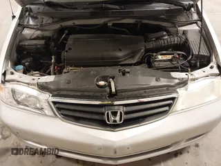 2004 Honda Odyssey EX-L with VIN 5FNRL18974B127696, listed as a IAAI auction lot 41643243 with 200,286 mi miles and . Bid and sale history available at DreamBid. Image 10.