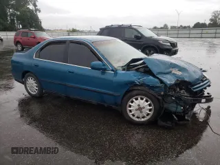 1995 Honda Accord LX with VIN 1HGCD5631SA066149, listed as a Copart auction lot 73461324 with 196,561 mi miles and Salvage Title. Bid and sale history available at DreamBid. Image 4.
