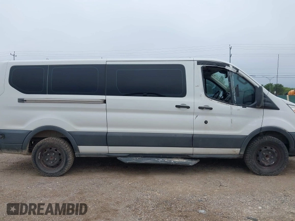 2016 Ford Transit XL z VIN 1FBZX2YM9GKA49741, wystawiony jako IAAI lot #42502394 z przebiegiem 70 321 mil mil oraz . Historia ofert i sprzedaży dostępna na DreamBid. Obrazek 13.