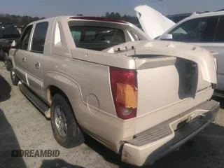 2002 Cadillac Escalade EXT z VIN 3GYEK63N02G293417, wystawiony jako IAAI lot #38929033 z przebiegiem Nie podano mil oraz . Historia ofert i sprzedaży dostępna na DreamBid. Obrazek 1.