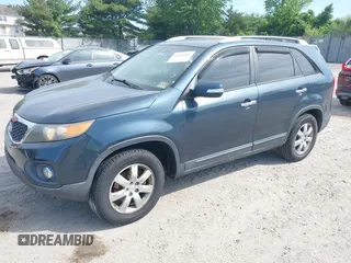 2011 Kia Sorento LX with VIN 5XYKT4A27BG085049, listed as a IAAI auction lot 42249462 with 218,039 mi miles and . Bid and sale history available at DreamBid. Image 2.