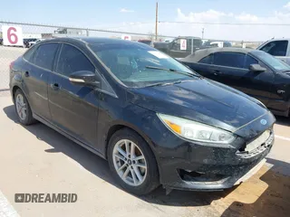 2015 Ford Focus SE z VIN 1FADP3F25FL261578, wystawiony jako IAAI lot #42502945 z przebiegiem 81 789 mil mil oraz . Historia ofert i sprzedaży dostępna na DreamBid. Obrazek 1.