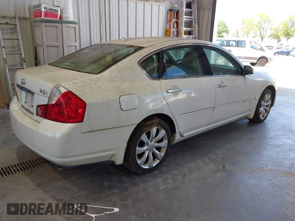 2006 Infiniti M z VIN JNKAY01F96M259781, wystawiony jako IAAI lot #42543436 z przebiegiem 214 940 mil mil oraz . Historia ofert i sprzedaży dostępna na DreamBid. Obrazek 4.