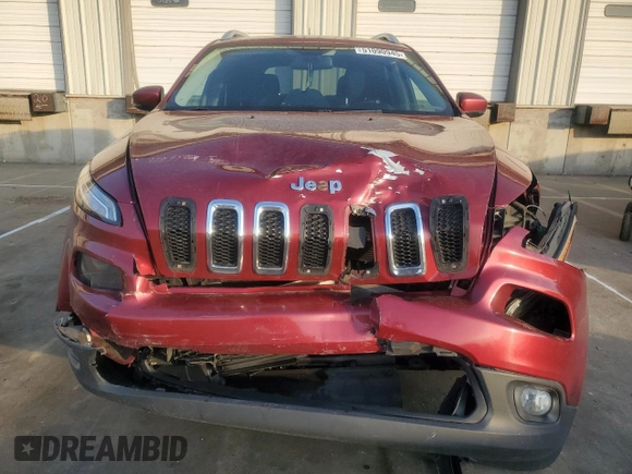 2016 Jeep Cherokee Latitude with VIN 1C4PJLCBXGW221848, listed as a Copart auction lot 51090945 with 216,945 mi miles and Salvage title. Bid and sale history available at DreamBid. Image 5.