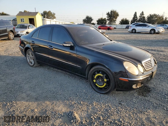 2003 Mercedes-Benz E-Class 3.2L with VIN WDBUF65J83A182953, listed as a Copart auction lot 69629174 with 336,517 mi miles and Salvage Title. Bid and sale history available at carsss.com. Image 4.