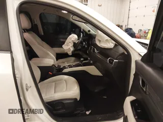 2018 Mazda CX-5 S Premium with VIN JM3KFBDM1J1412088, listed as a IAAI auction lot 41497431 with 65,532 mi miles and . Bid and sale history available at DreamBid. Image 5.