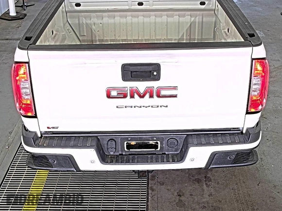 2021 GMC Canyon 2WD Elevation z VIN 1GTG5CEN5M1140499, wystawiony jako IAAI lot #42556124 z przebiegiem 41 450 mil mil oraz . Historia ofert i sprzedaży dostępna na DreamBid. Obrazek 19.
