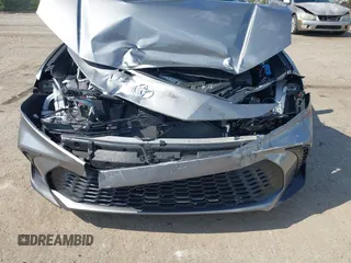 2025 Toyota Camry LE with VIN 4T1DAACK5SU539156, listed as a IAAI auction lot 42054268 with 5,705 mi miles and . Bid and sale history available at DreamBid. Image 6.