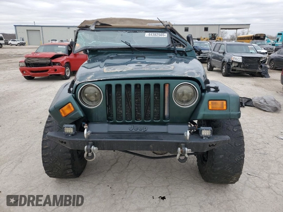2000 Jeep Wrangler Sahara z VIN 1J4FA59S5YP803327, wystawiony jako Copart lot #44382505 z przebiegiem Nie podano mil oraz Szkoda całkowita • Salvage title. Historia ofert i sprzedaży dostępna na DreamBid. Obrazek 5.