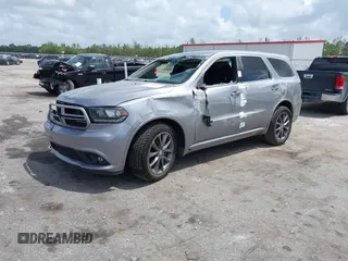 2017 Dodge Durango GT with VIN 1C4RDHDG4HC953659, listed as a IAAI auction lot 41959391 with 136,515 mi miles and . Bid and sale history available at carsss.com. Image 2.