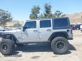 2018 Jeep Wrangler Unlimited Sport with VIN 1C4BJWDG4JL807265, listed as a IAAI auction lot 42520648 with 69,229 mi miles and . Bid and sale history available at DreamBid. Image 15.