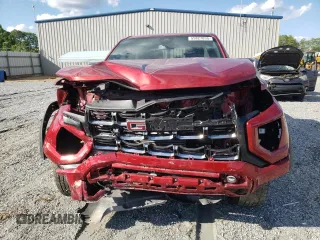 2024 GMC Canyon 4WD AT4 with VIN 1GTP6DEK3R1149427, listed as a Copart auction lot 55827855 with 12,411 mi miles and Salvage Title. Bid and sale history available at carsss.com. Image 5.