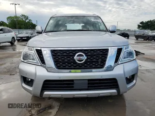 2018 Nissan Armada SL z VIN JN8AY2ND6J9058698, wystawiony jako Copart lot #53836475 z przebiegiem 147 336 mil mil oraz Szkody całkowita. Historia ofert i sprzedaży dostępna na DreamBid. Obrazek 5.
