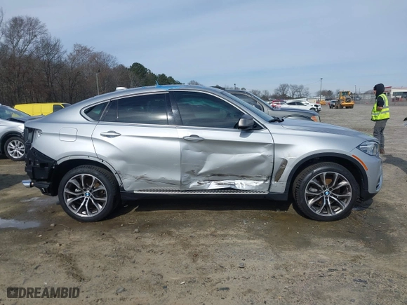 2019 BMW X6 xDrive35i with VIN 5UXKU2C52K0Z63984, listed as a IAAI auction lot 41612265 with 65,634 mi miles. Bid and sale history available at carsss.com. Image 14.