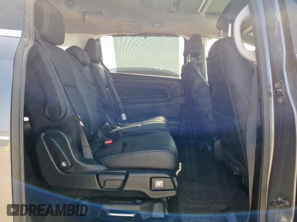 2023 Honda Odyssey Touring with VIN 5FNRL6H89PB053593, listed as a Copart auction lot 64836685 with 26,568 mi miles and Salvage title. Bid and sale history available at DreamBid. Image 10.