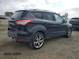 2014 Ford Escape Titanium with VIN 1FMCU9J90EUC89590, listed as a Copart auction lot 43985065 with 128,878 mi miles and Salvage Title. Bid and sale history available at carsss.com. Image 3.