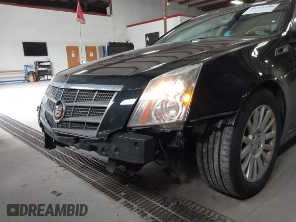 2011 Cadillac CTS Luxury with VIN 1G6DG5EYXB0145058, listed as a IAAI auction lot 41973156 with 143,246 mi miles and . Bid and sale history available at carsss.com. Image 6.
