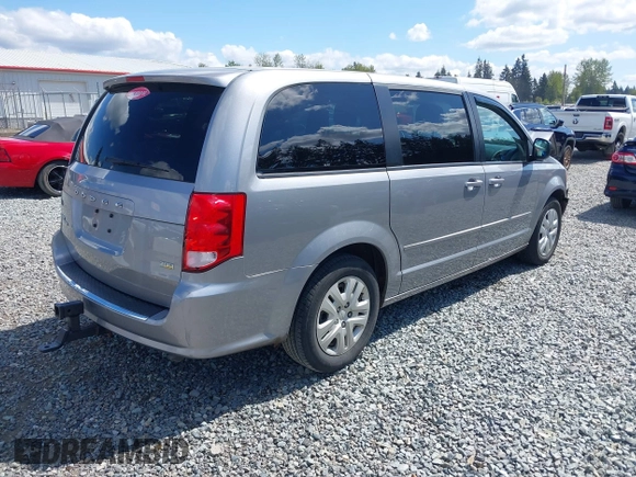 2016 Dodge Grand Caravan SE with VIN 2C4RDGBGXGR220549, listed as a IAAI auction lot 42074110 with 114,826 mi miles and . Bid and sale history available at DreamBid. Image 4.