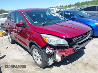 2016 Ford Escape SE with VIN 1FMCU9GX9GUC71209, listed as a IAAI auction lot 42037642 with 82,521 mi miles and . Bid and sale history available at DreamBid. Image 1.