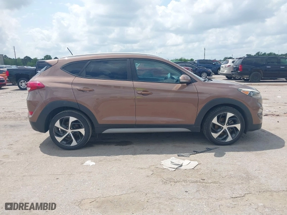 2017 Hyundai Tucson Value with VIN KM8J33A27HU430198, listed as a IAAI auction lot 42104369 with 163,929 mi miles. Bid and sale history available at carsss.com. Image 13.