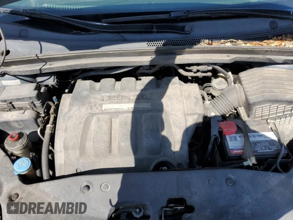 2006 Honda Odyssey EX-L z VIN 5FNRL38686B025733, wystawiony jako Copart lot #57657425 z przebiegiem 214 303 mil mil oraz Szkoda całkowita • Salvage title. Historia ofert i sprzedaży dostępna na DreamBid. Obrazek 12.
