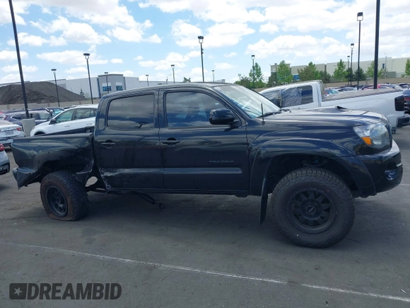 2011 Toyota Tacoma with VIN 3TMLU4EN5BM075967, listed as a IAAI auction lot 42228409 with 158,241 mi miles and . Bid and sale history available at DreamBid. Image 14.